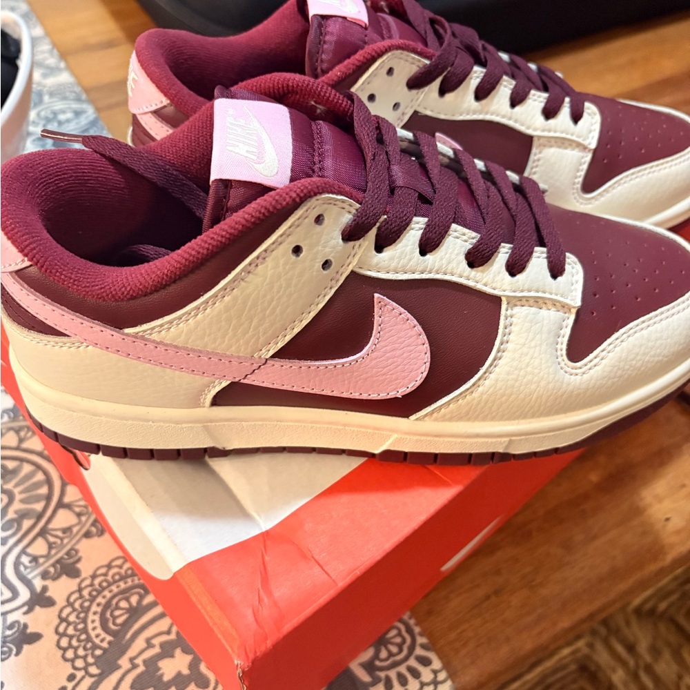 Nike dunk low.  Burgundy and Light Pink Sneakers